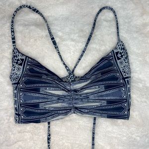 Convert able blue and white bathing suit top.